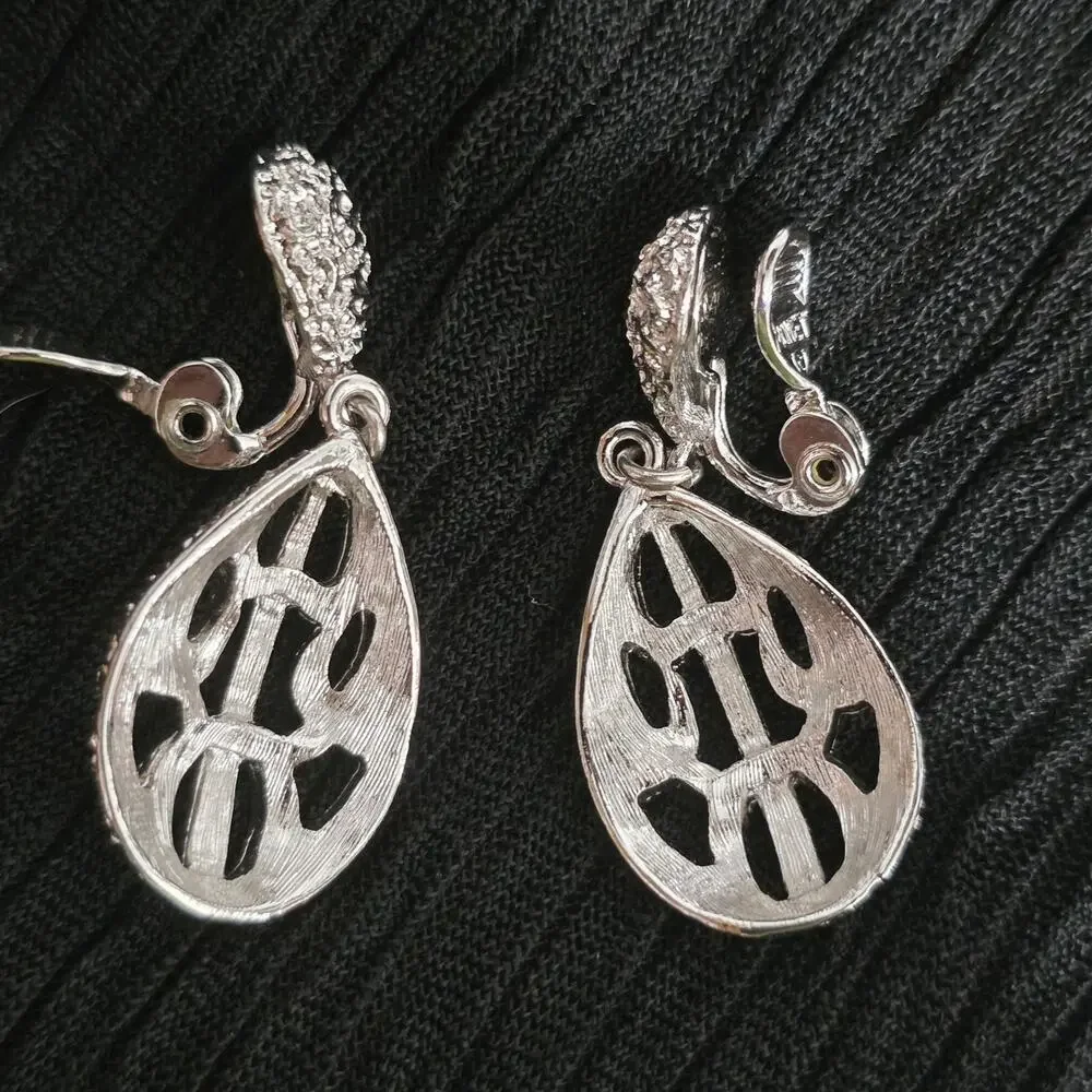 Monet Silver Tone Filigree Dangle Clip On Earrings Vintage Textured